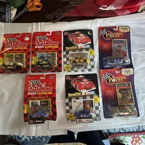 Vintage NASCAR Collection of 7- 1/64 Scale Die-cast Cars Unopened